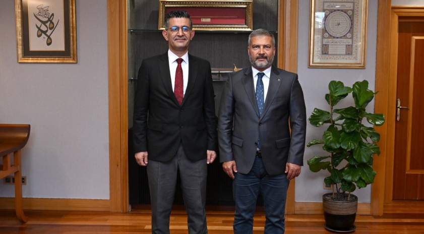 Cumhurbaşkanlığı İletişim Başkanlığı Afyonkarahisar B&ouml;lge M&uuml;d&uuml;r&uuml; &Ouml;mer S&uuml;t'ten Rekt&ouml;r Adıg&uuml;zel'e ziyaret